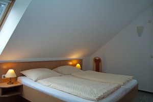 Doppelbett der Unterkunft für 4 Personen im Sonnenhus Rügen in Sellin